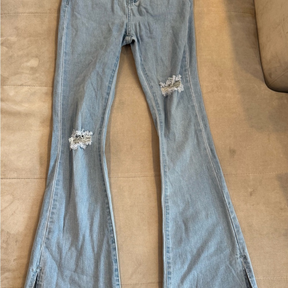 Women's Distressed Blue Jeans